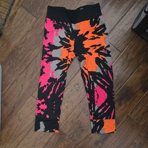 Puma Crop Leggings in Pink, Orange, and Black